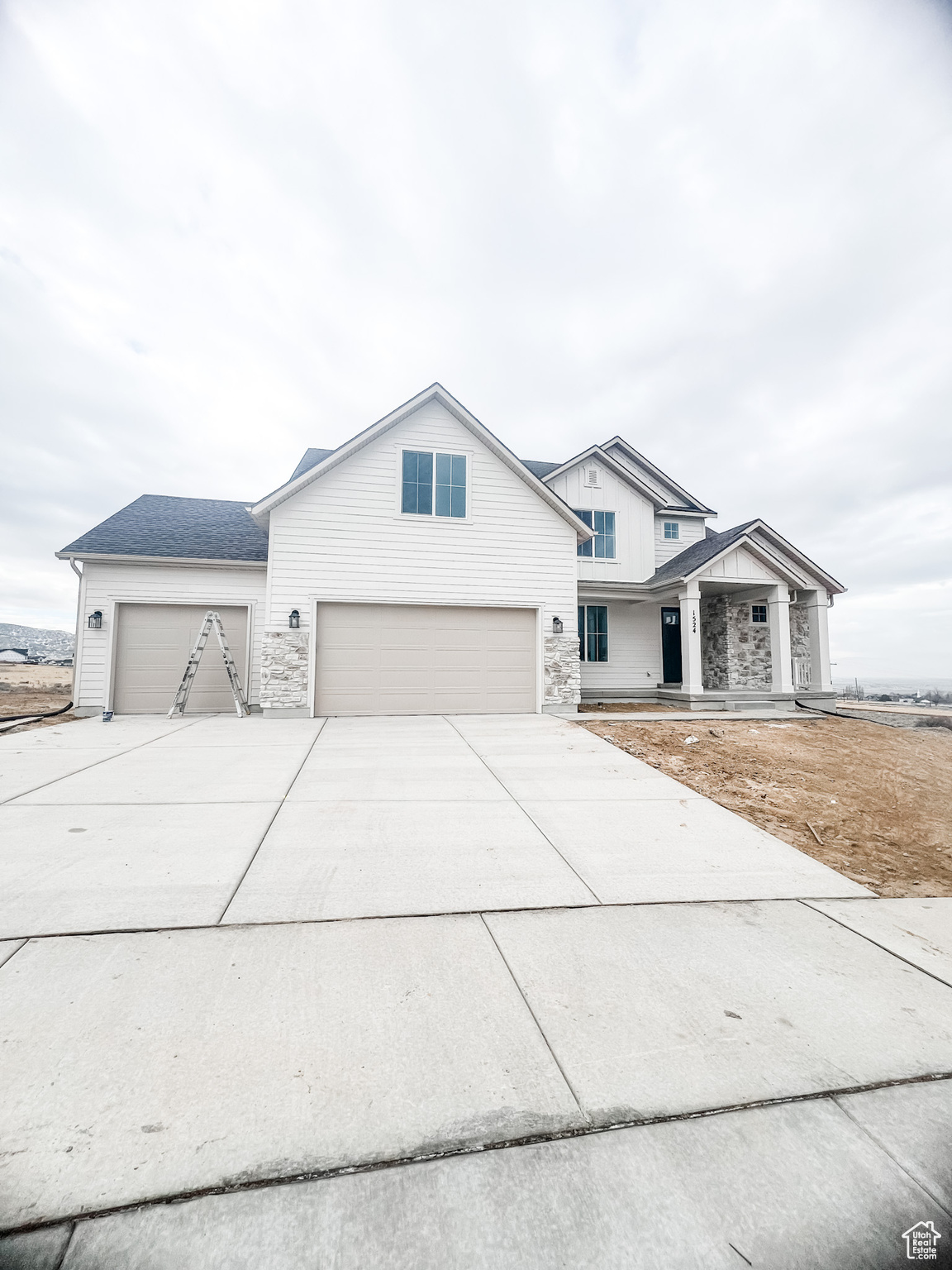 View of front of house with a garage