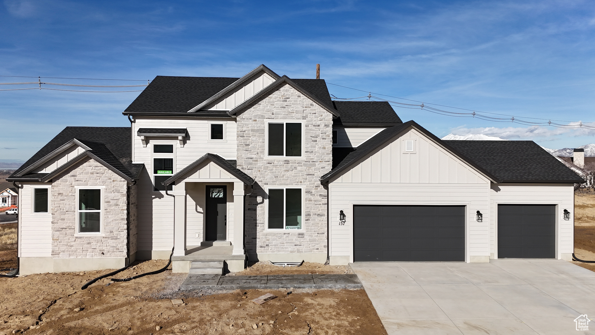 View of front of property with a garage