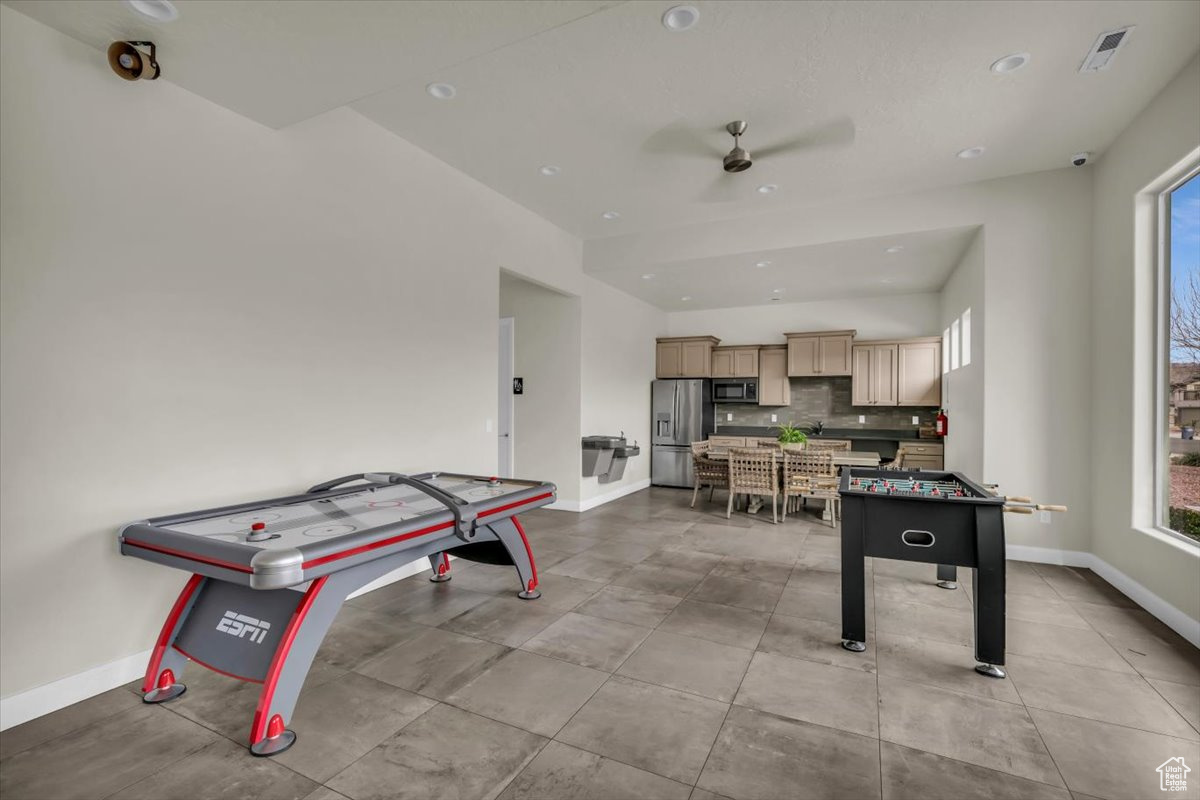 Recreation room featuring ceiling fan