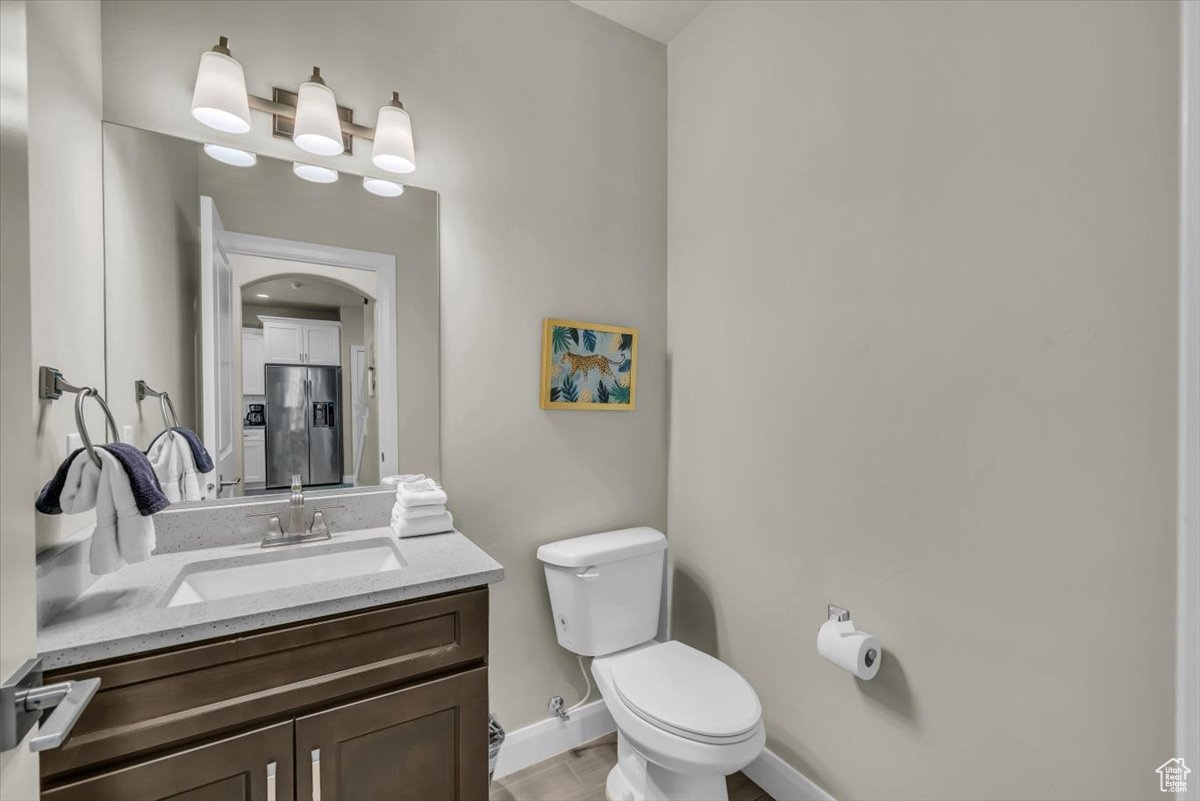 Bathroom with vanity and toilet