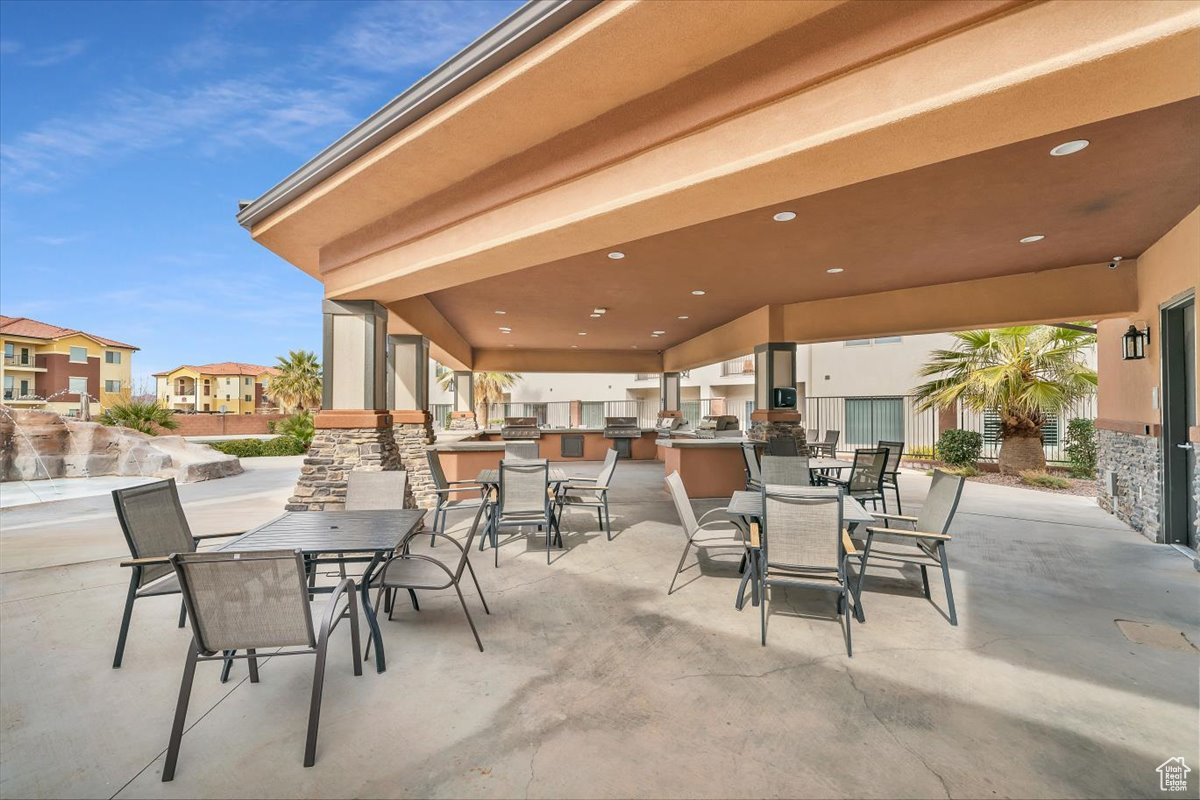 View of patio with an outdoor kitchen