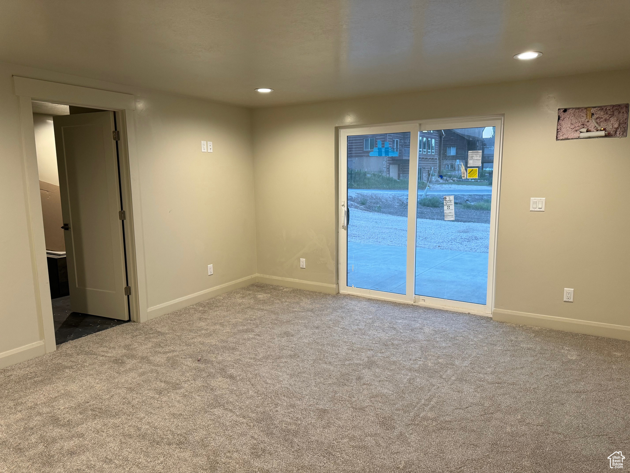 Empty room featuring carpet floors