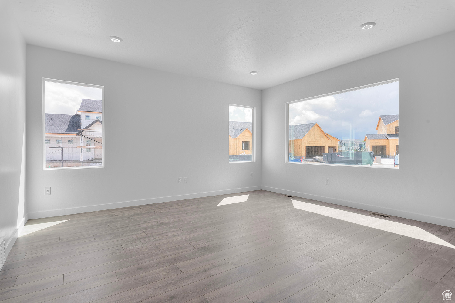 Unfurnished room featuring light hardwood / wood-style floors