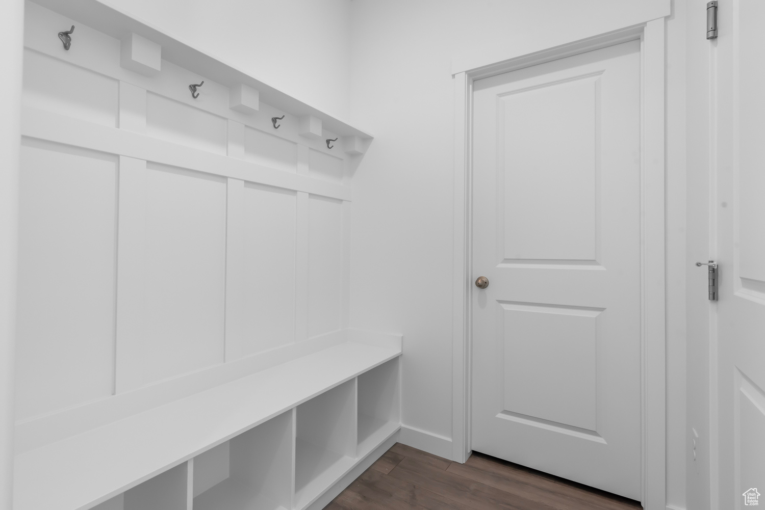 Mudroom with dark wood-type flooring