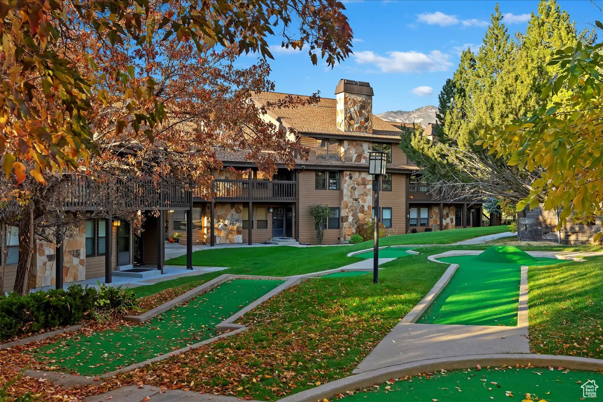 Surrounding community featuring a lawn