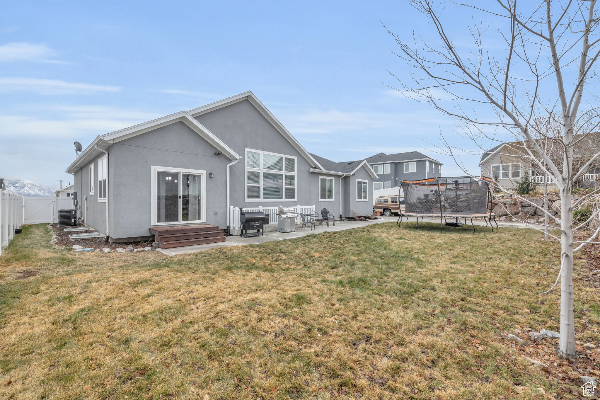 Rear view of house with a patio area