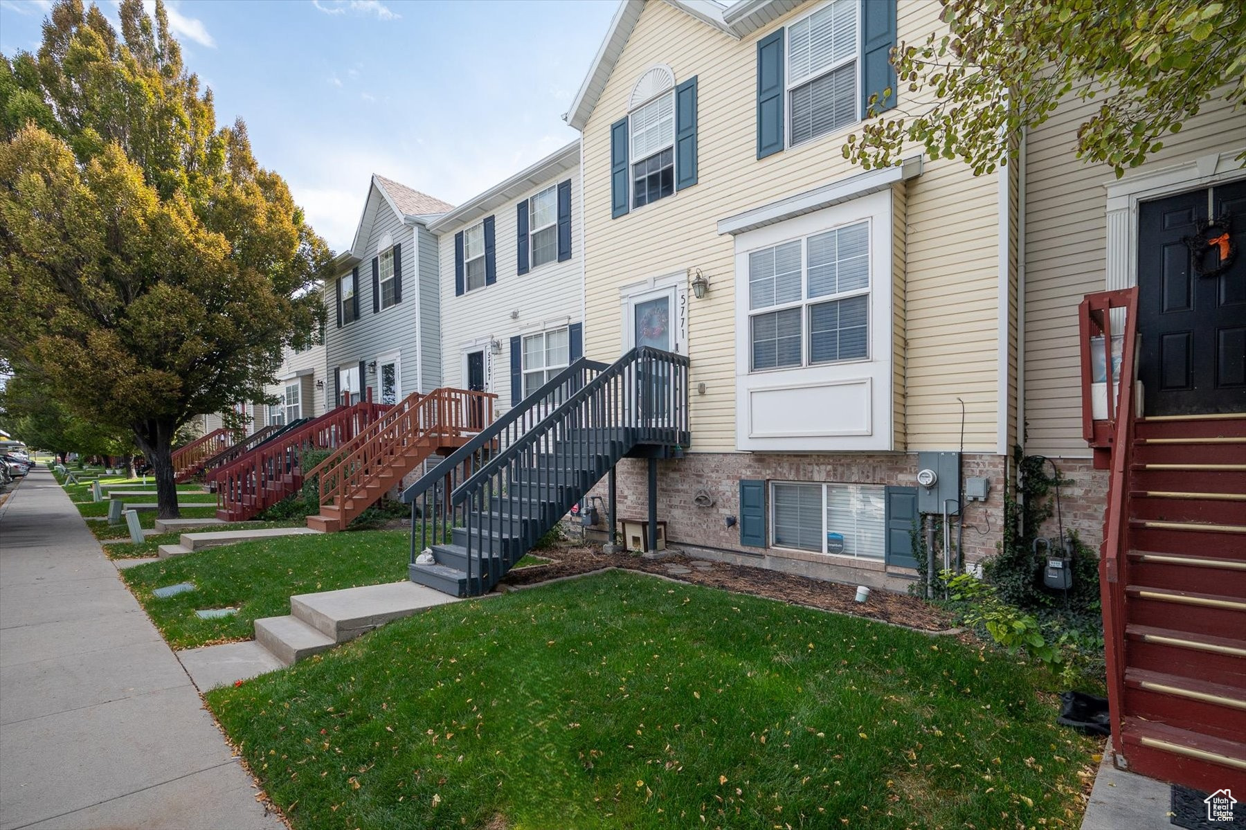 Exterior space featuring a front yard