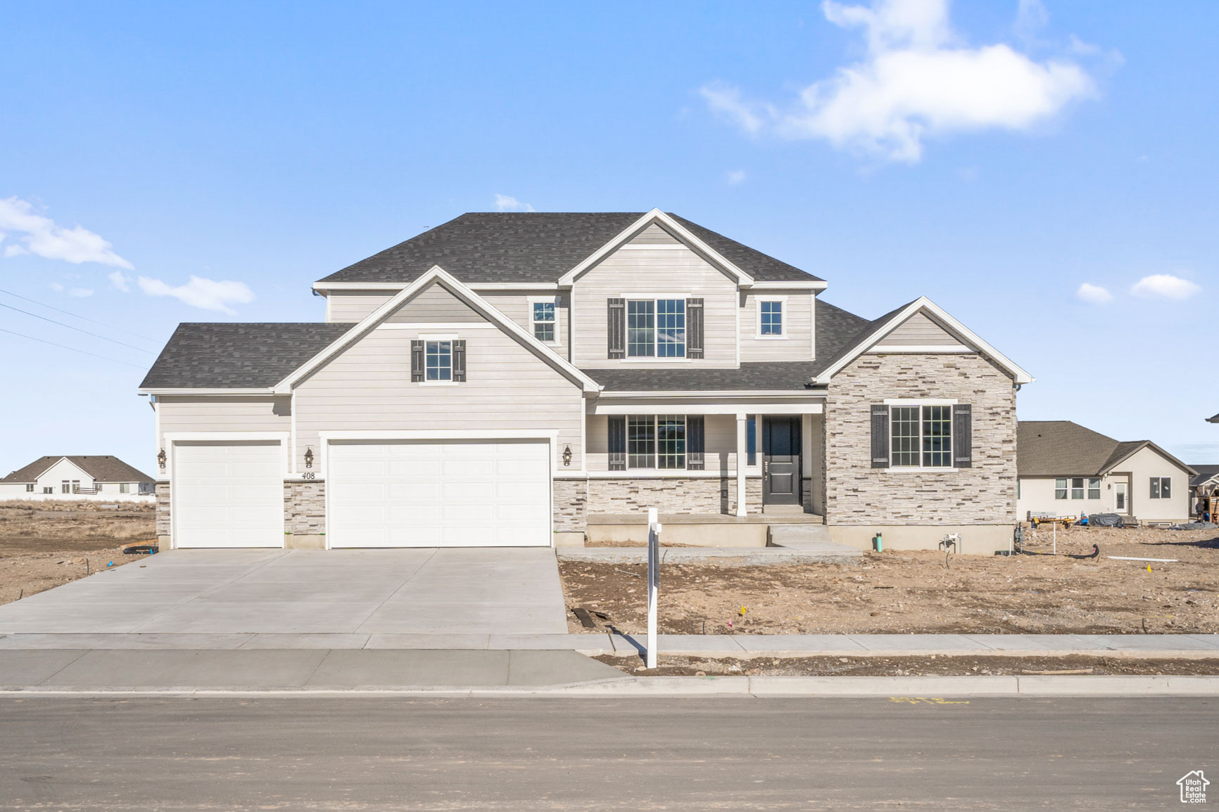 Craftsman-style home featuring a garage and covered porch