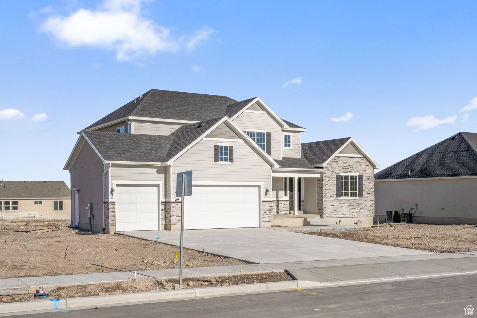 Craftsman-style home with a garage