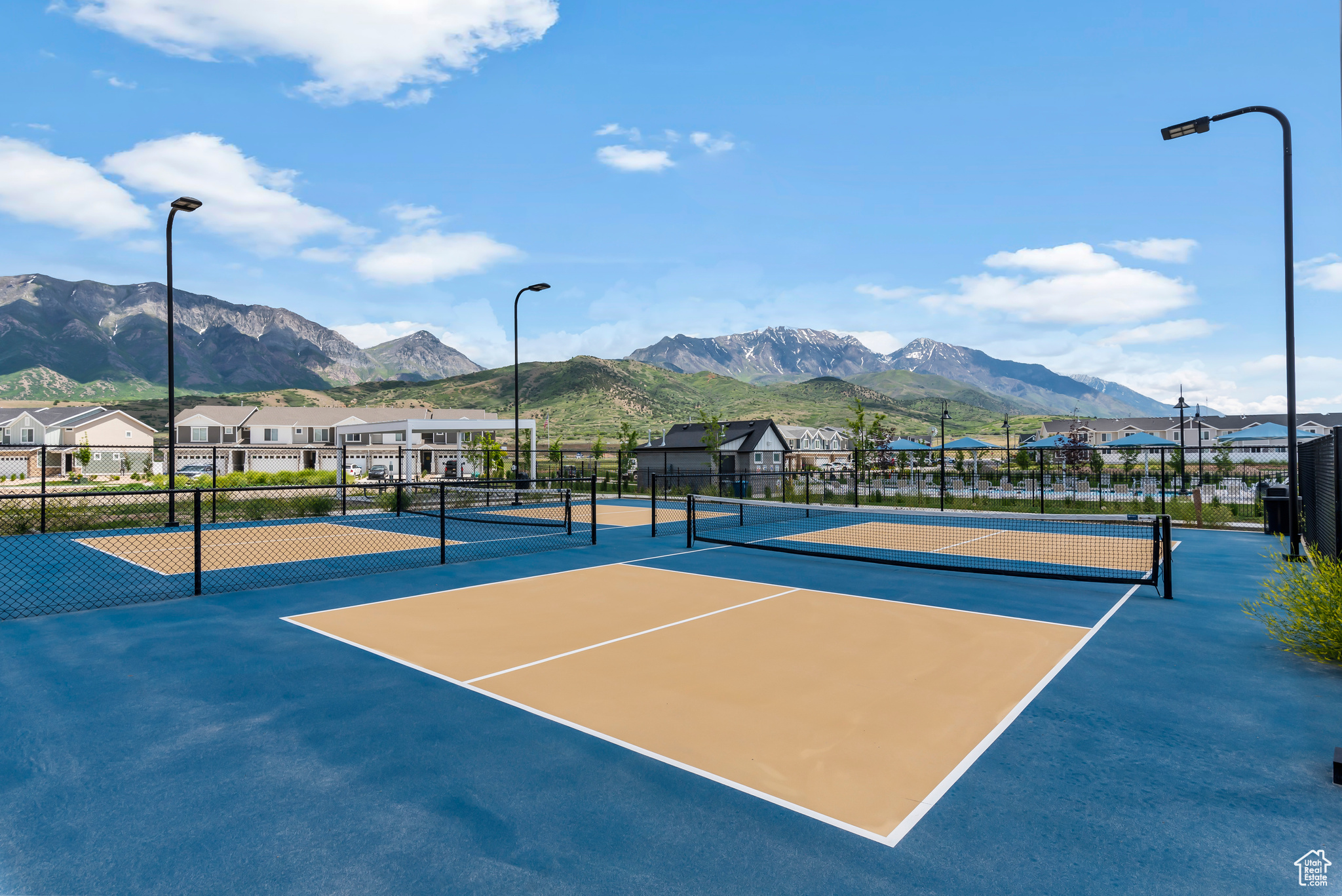 View of sport court featuring a mountain view and basketball court