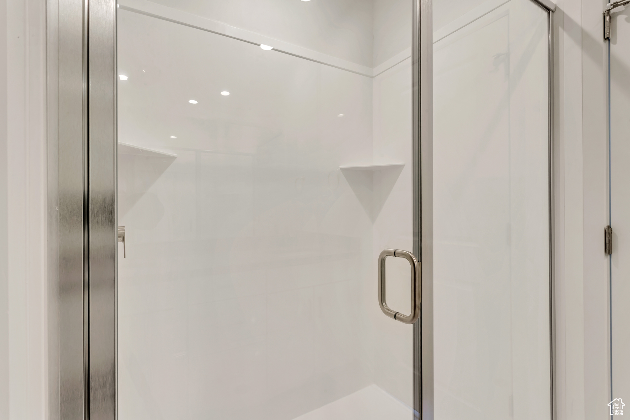 Bathroom with an enclosed shower