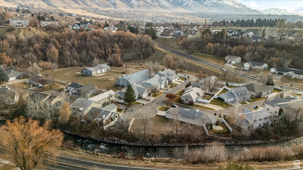 Birds eye view of property featuring a mountain view