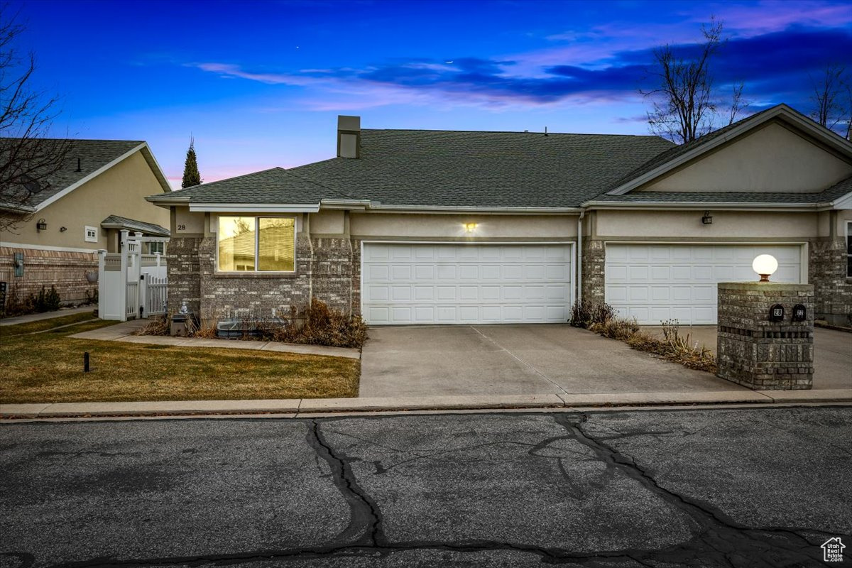 Ranch-style home with a garage