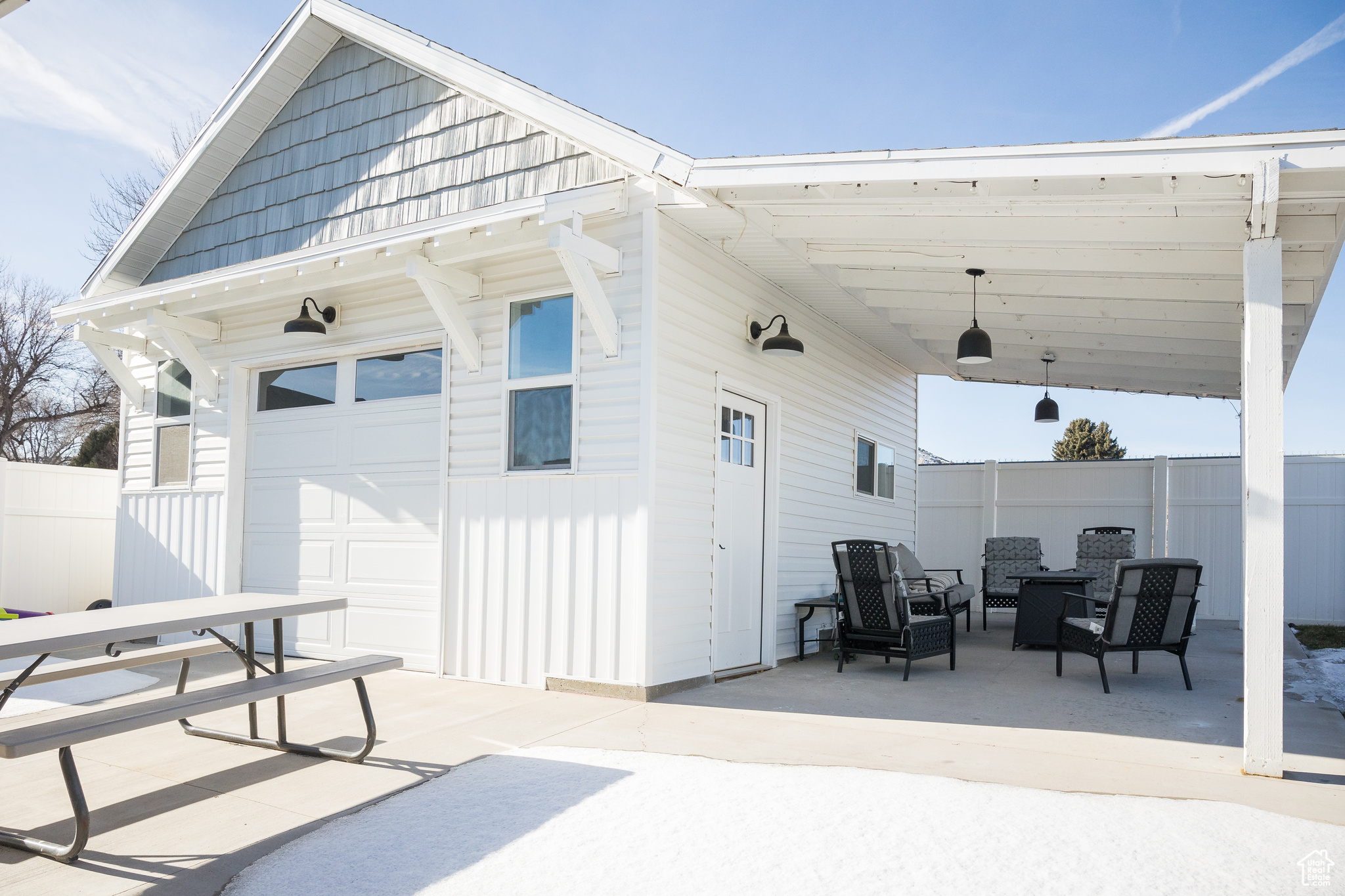 View of patio featuring a garage