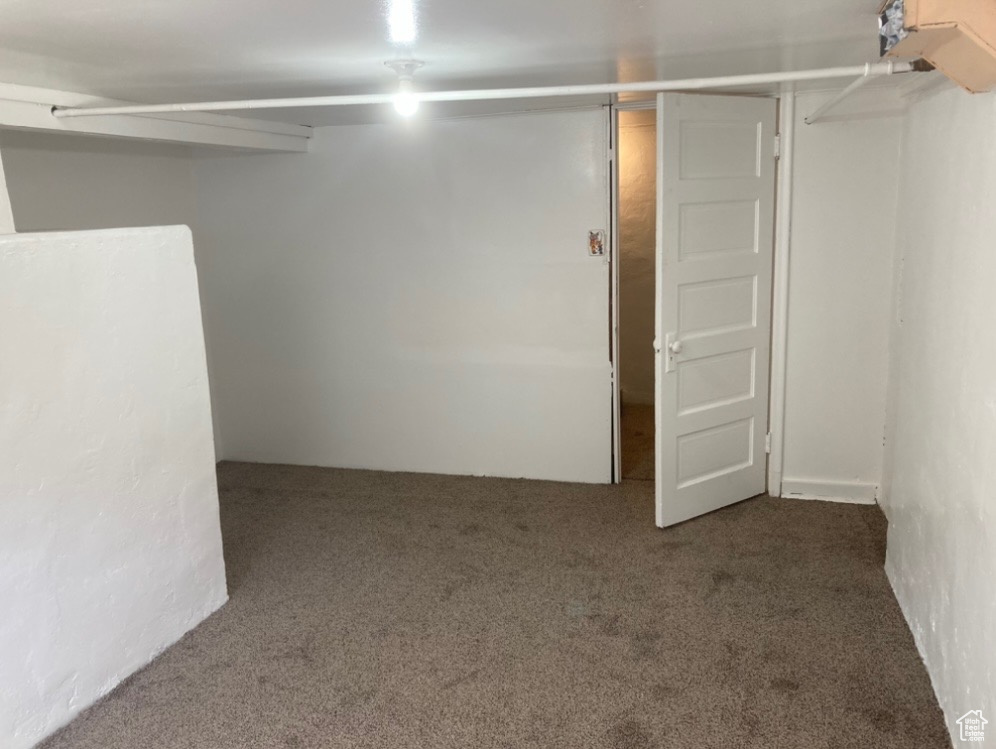 Basement with carpet floors