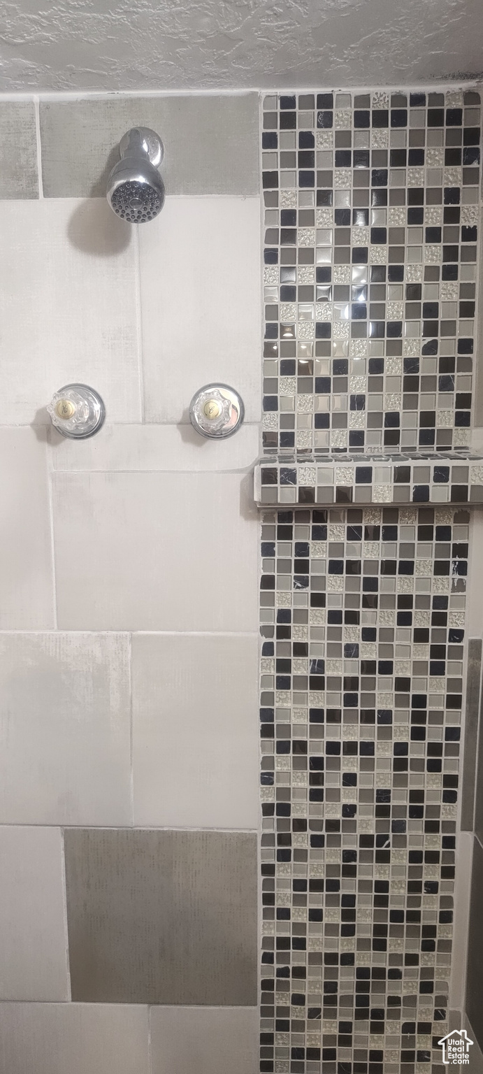 Bathroom with tiled shower