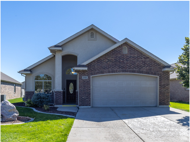 View of front facade with a garage