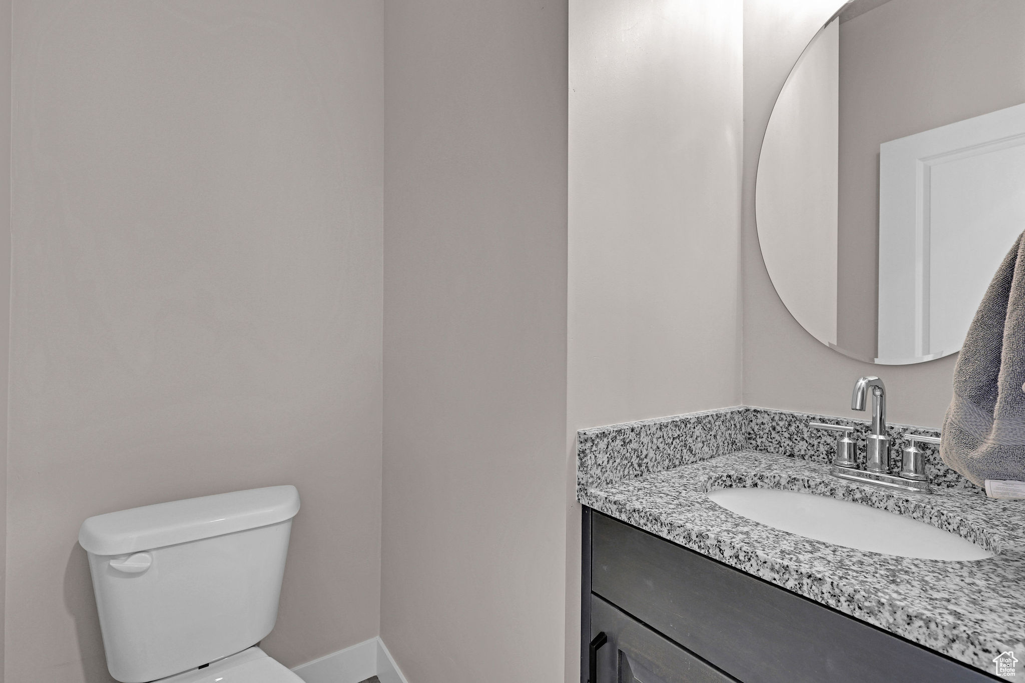 Bathroom with vanity and toilet