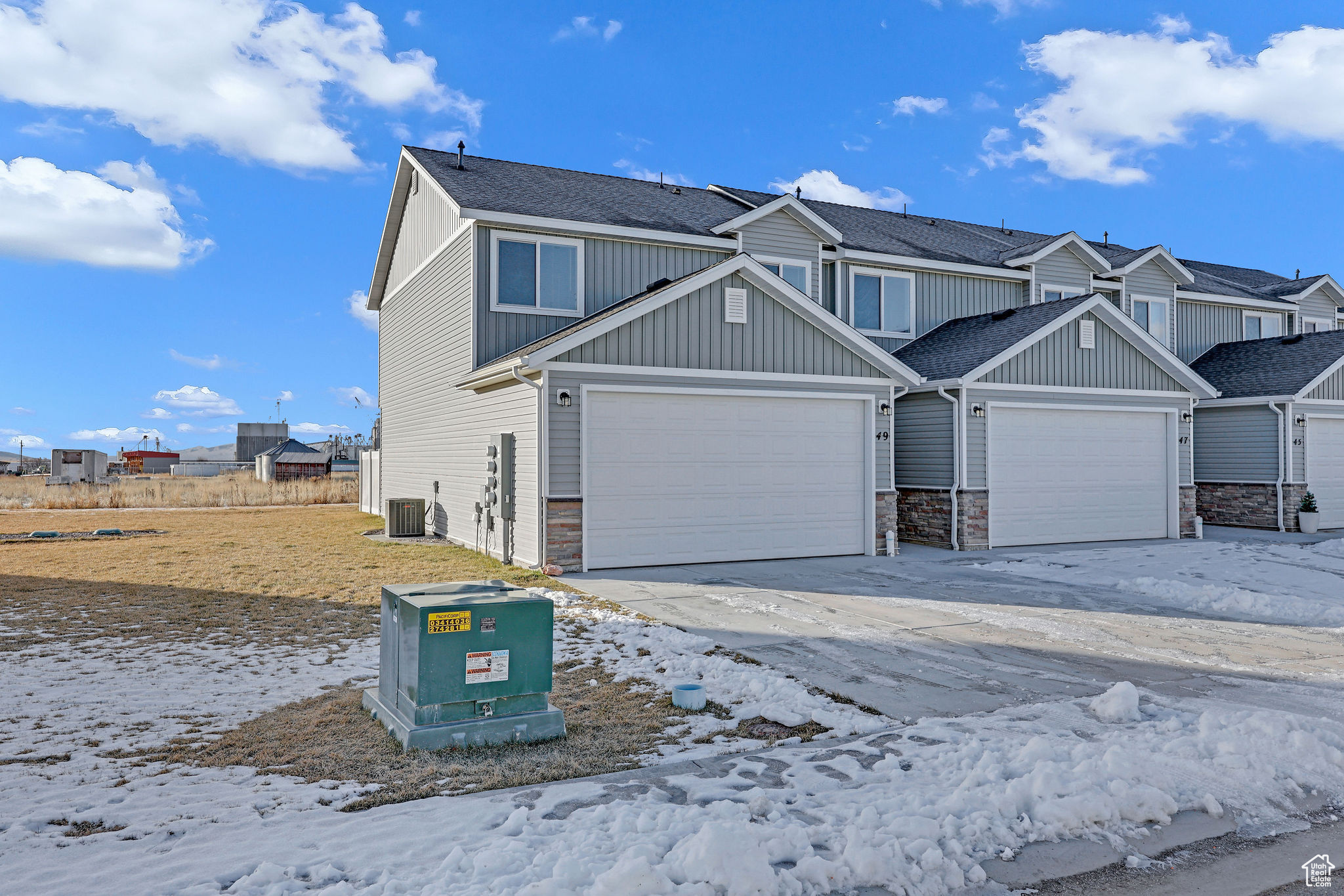 View of front of home featuring central AC unit