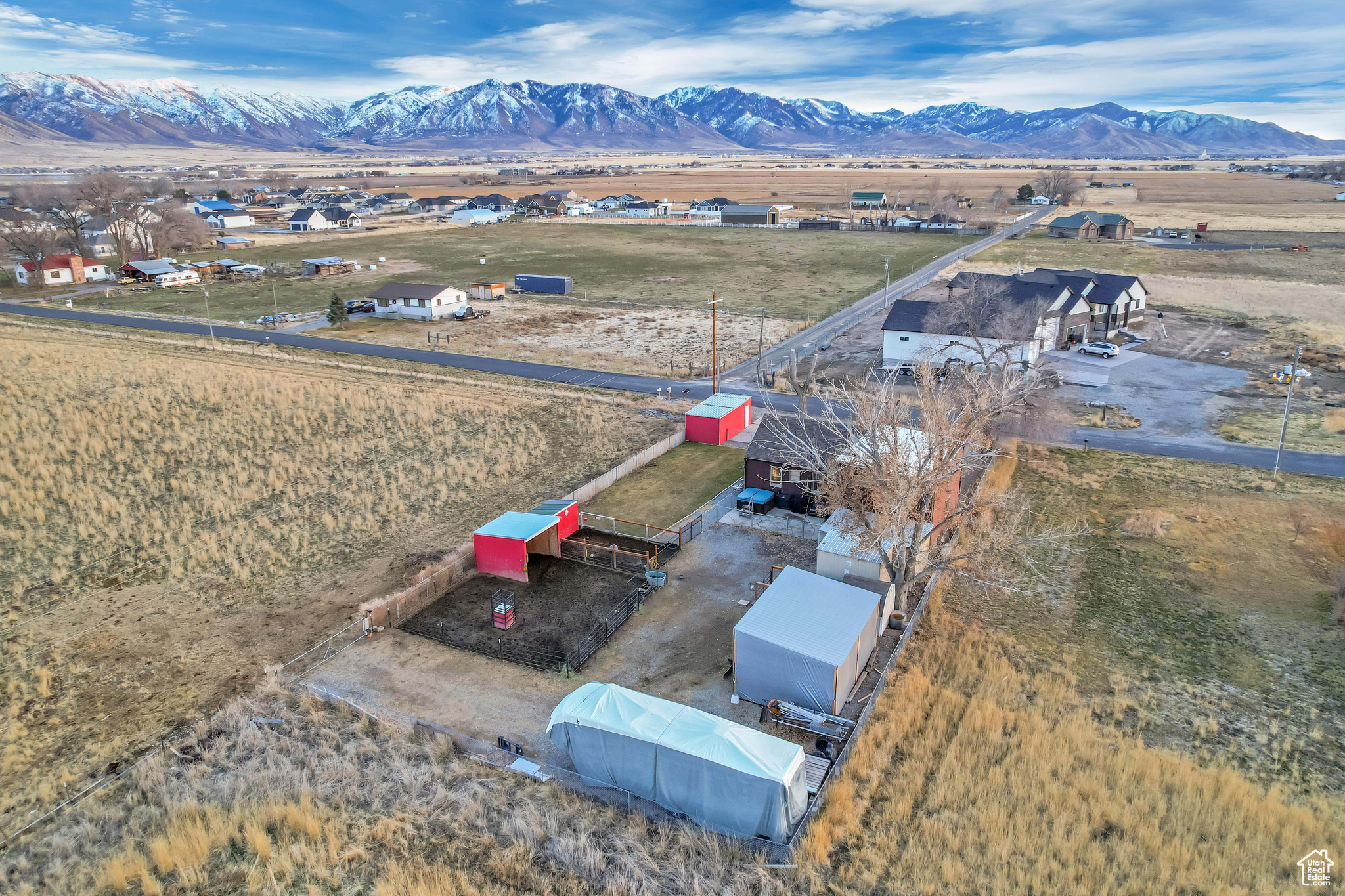 Birds eye view of property with a mountain view to the south