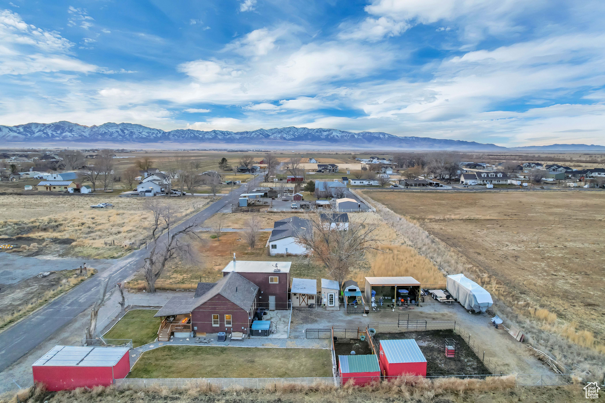 Birds eye view of property with a mountain view to the west