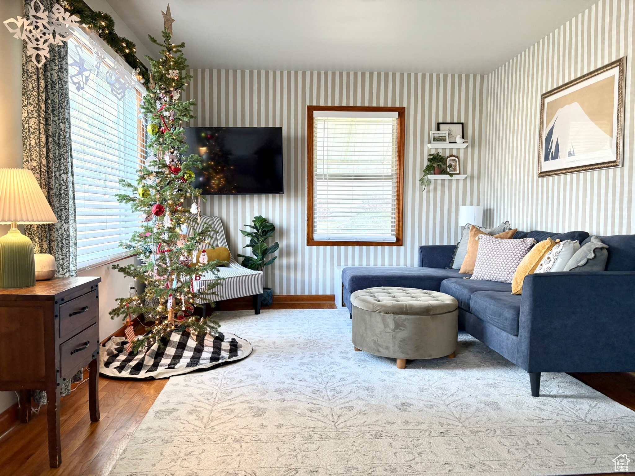 Living room with hardwood / wood-style floors and plenty of natural light