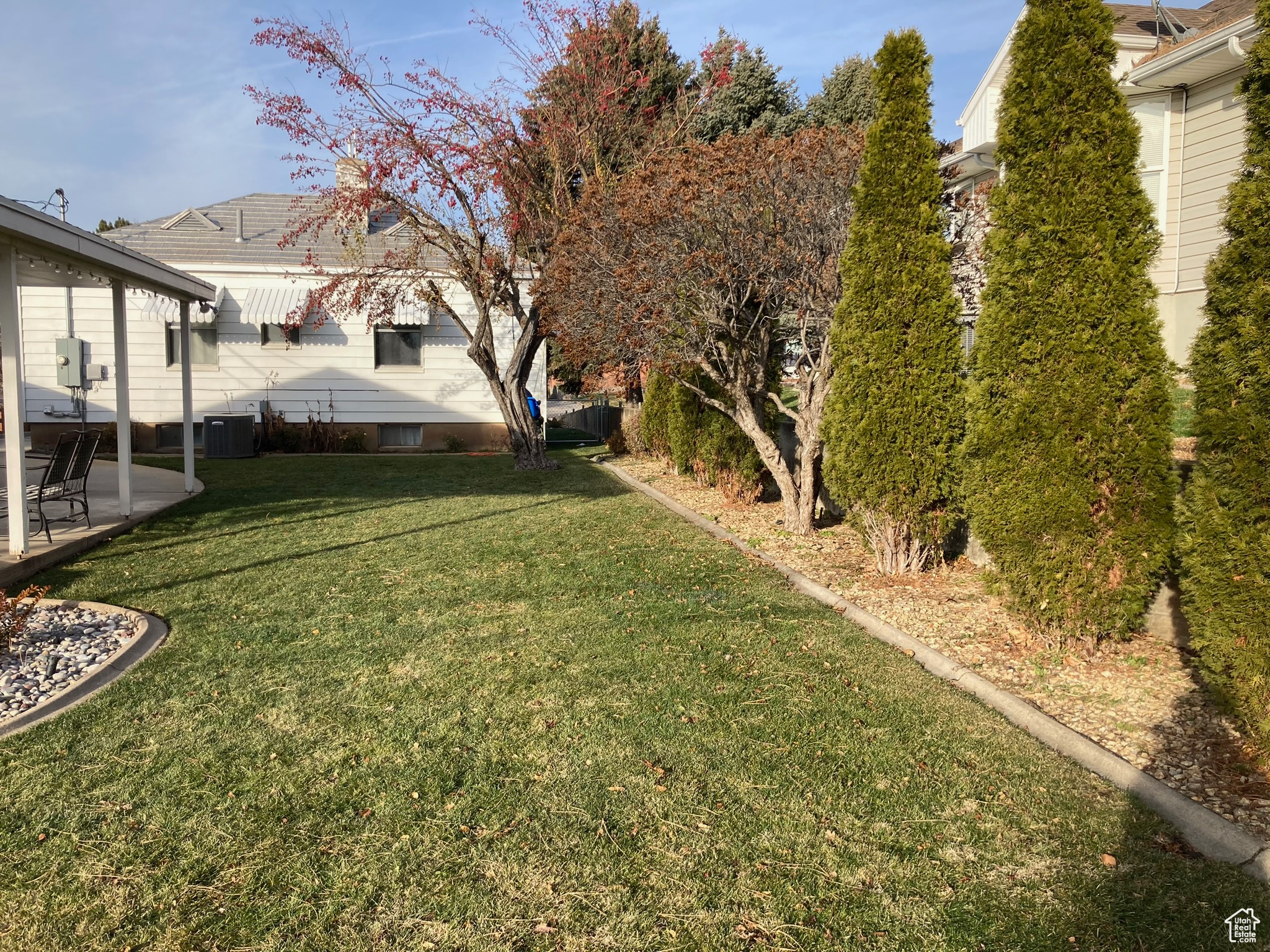 View of yard featuring cooling unit