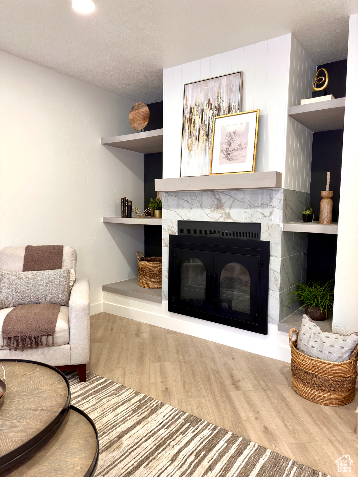 Living room with light hardwood / wood-style floors