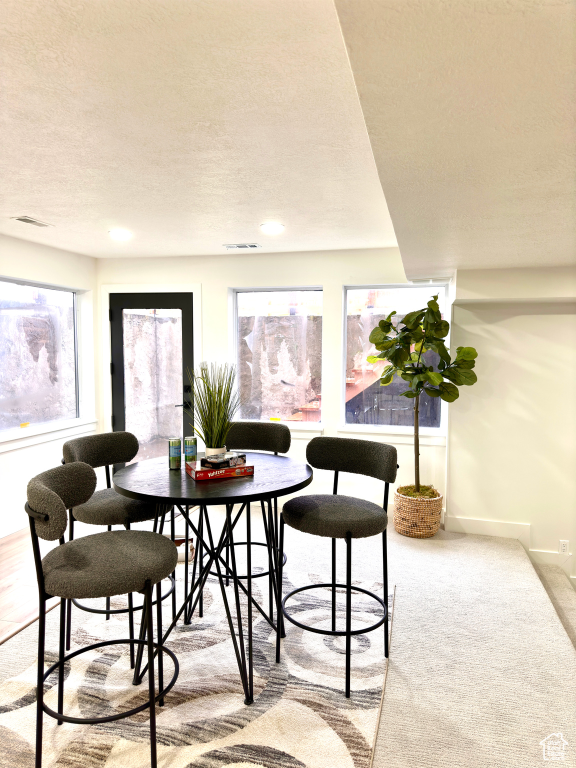 View of carpeted dining space