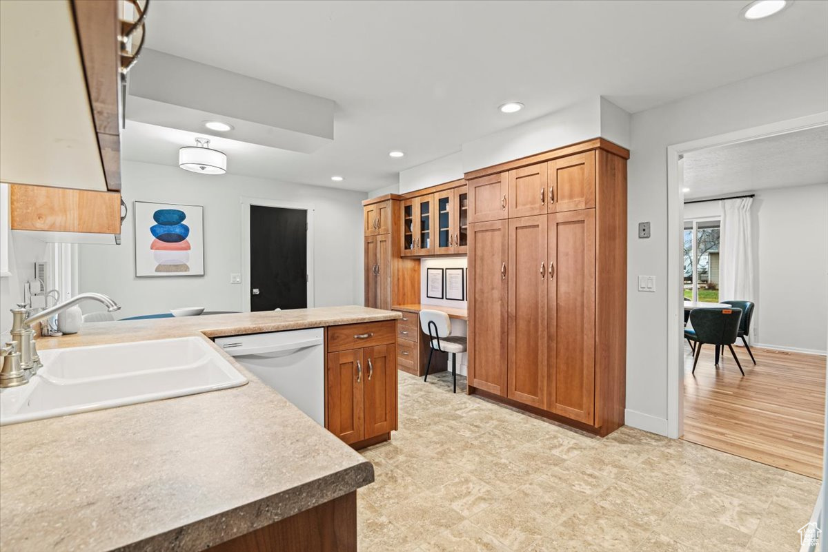 Kitchen with sink and white dishwasher