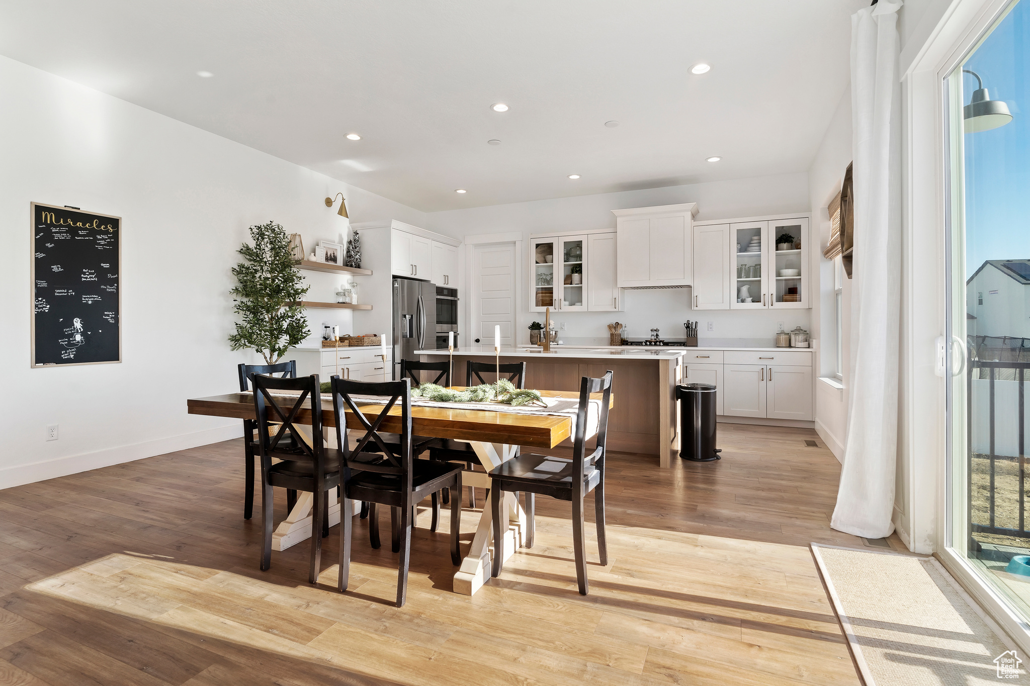 Dining space featuring light hardwood / wood-style flooring