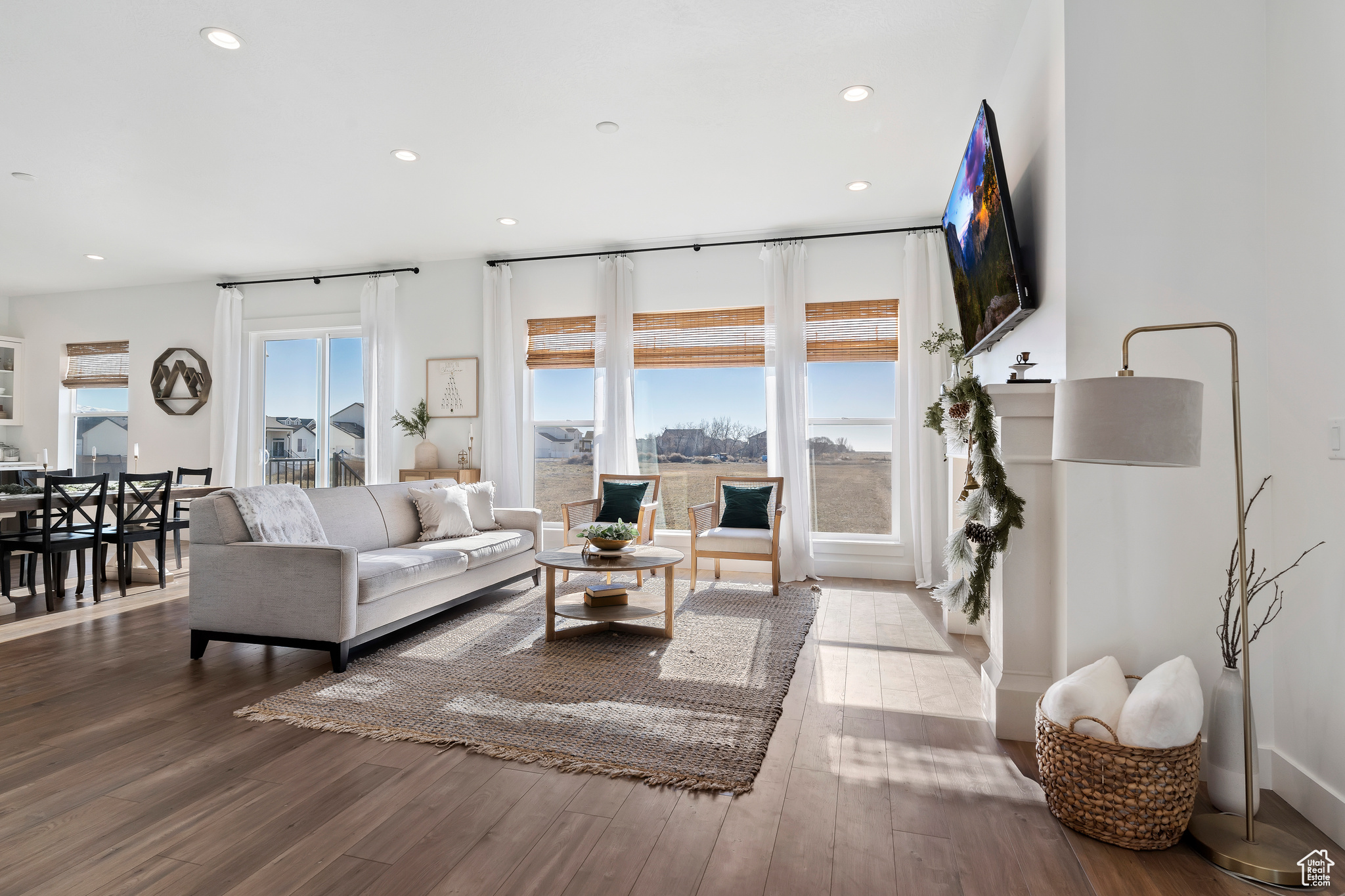 Living room with hardwood / wood-style flooring