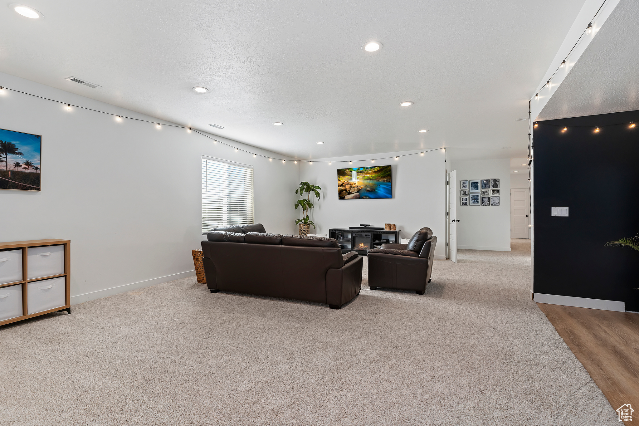 Living room with light carpet