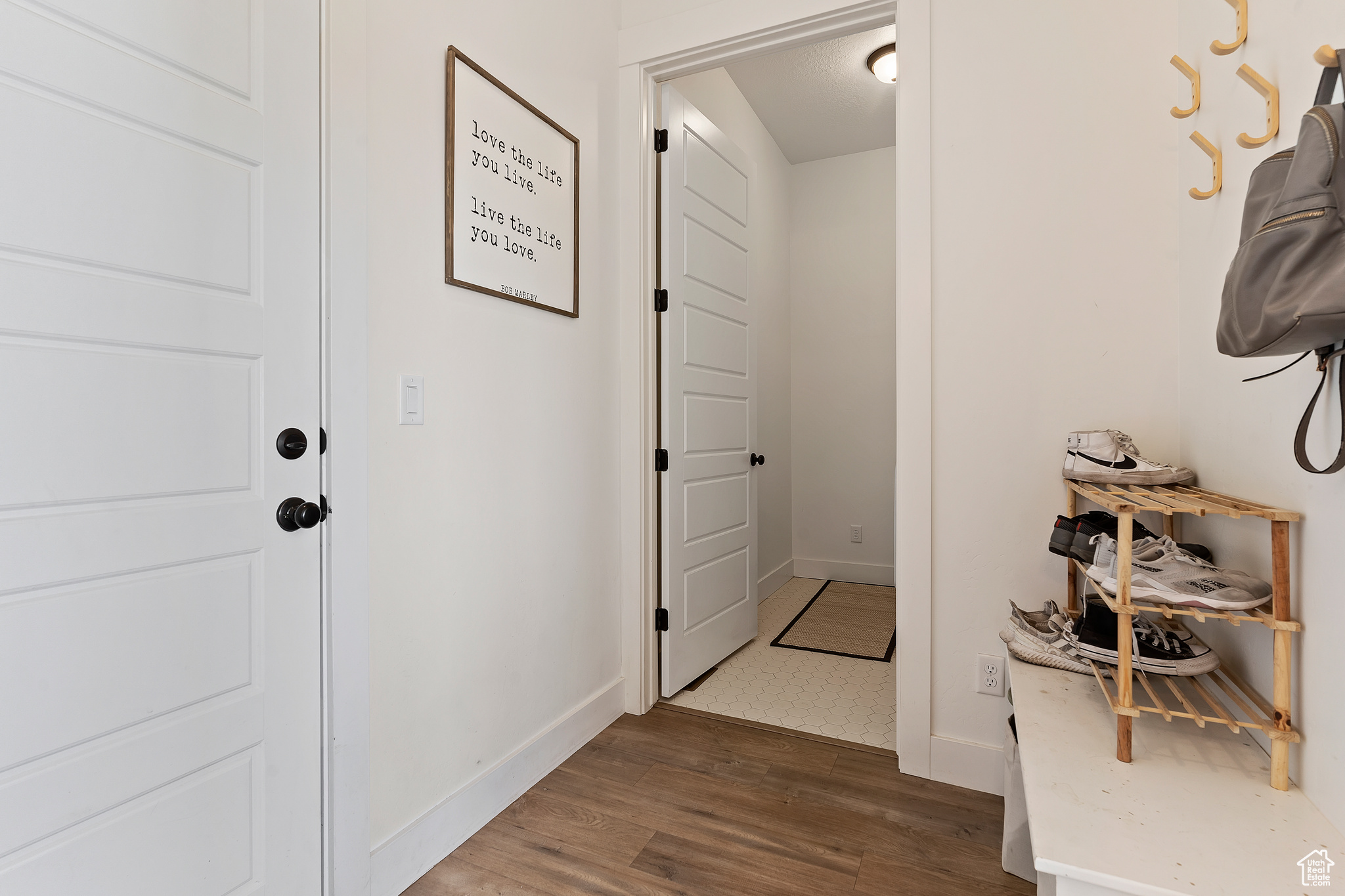 Hallway featuring dark hardwood / wood-style floors