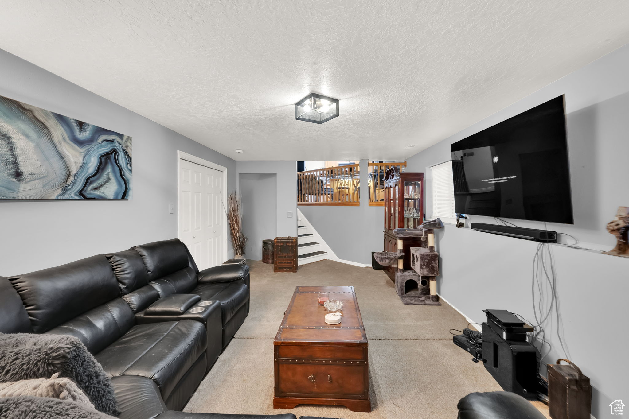 Living room with a textured ceiling