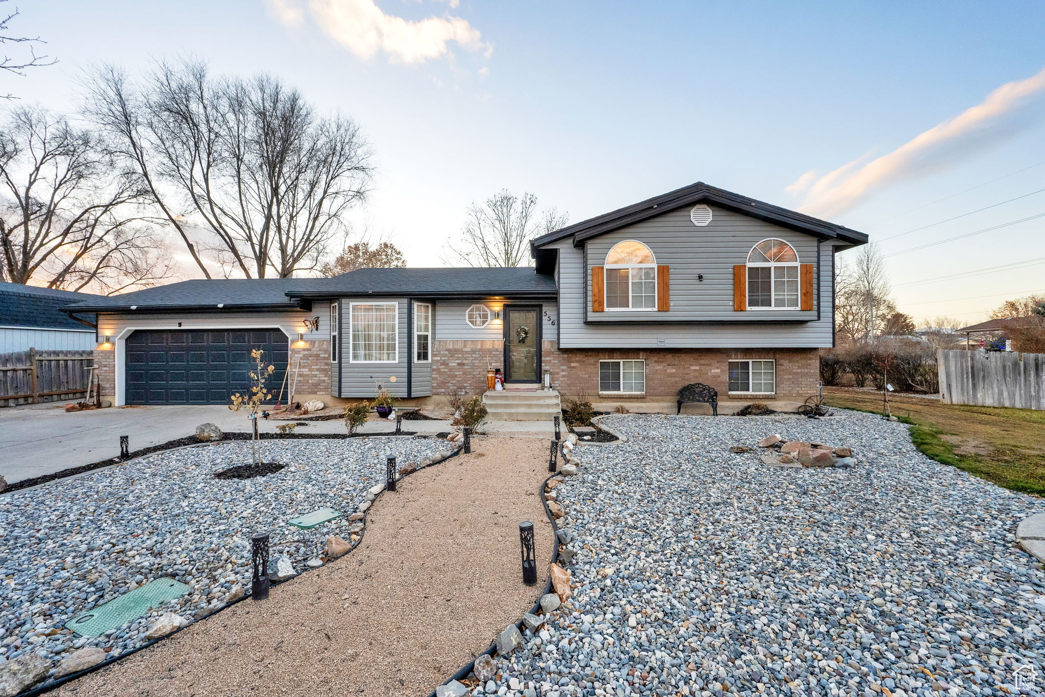 Split level home featuring a garage