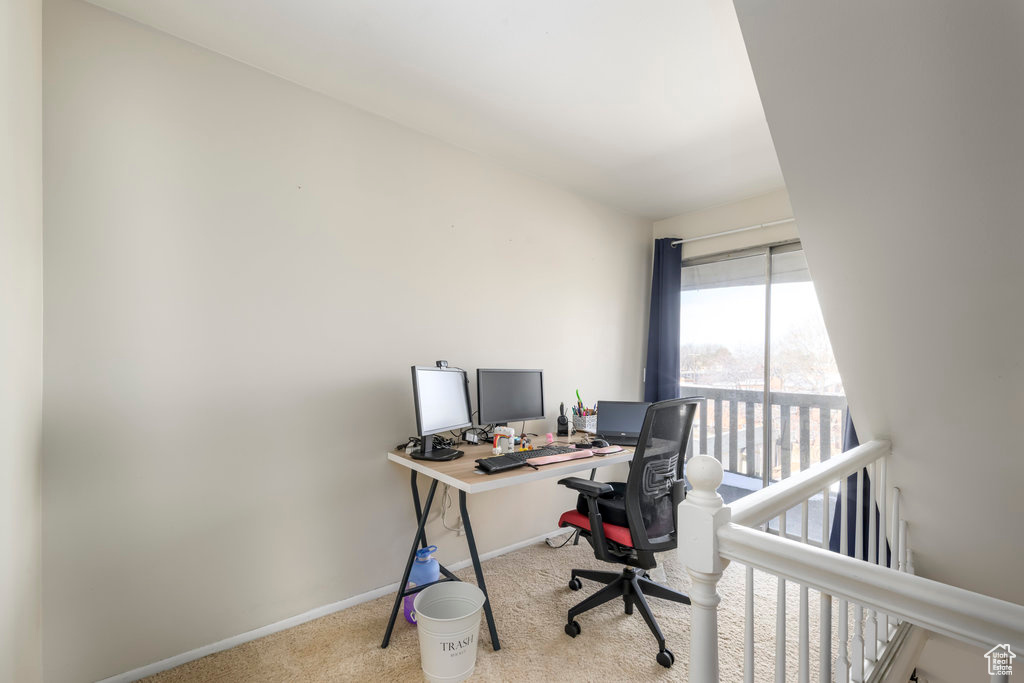 Office area with light colored carpet