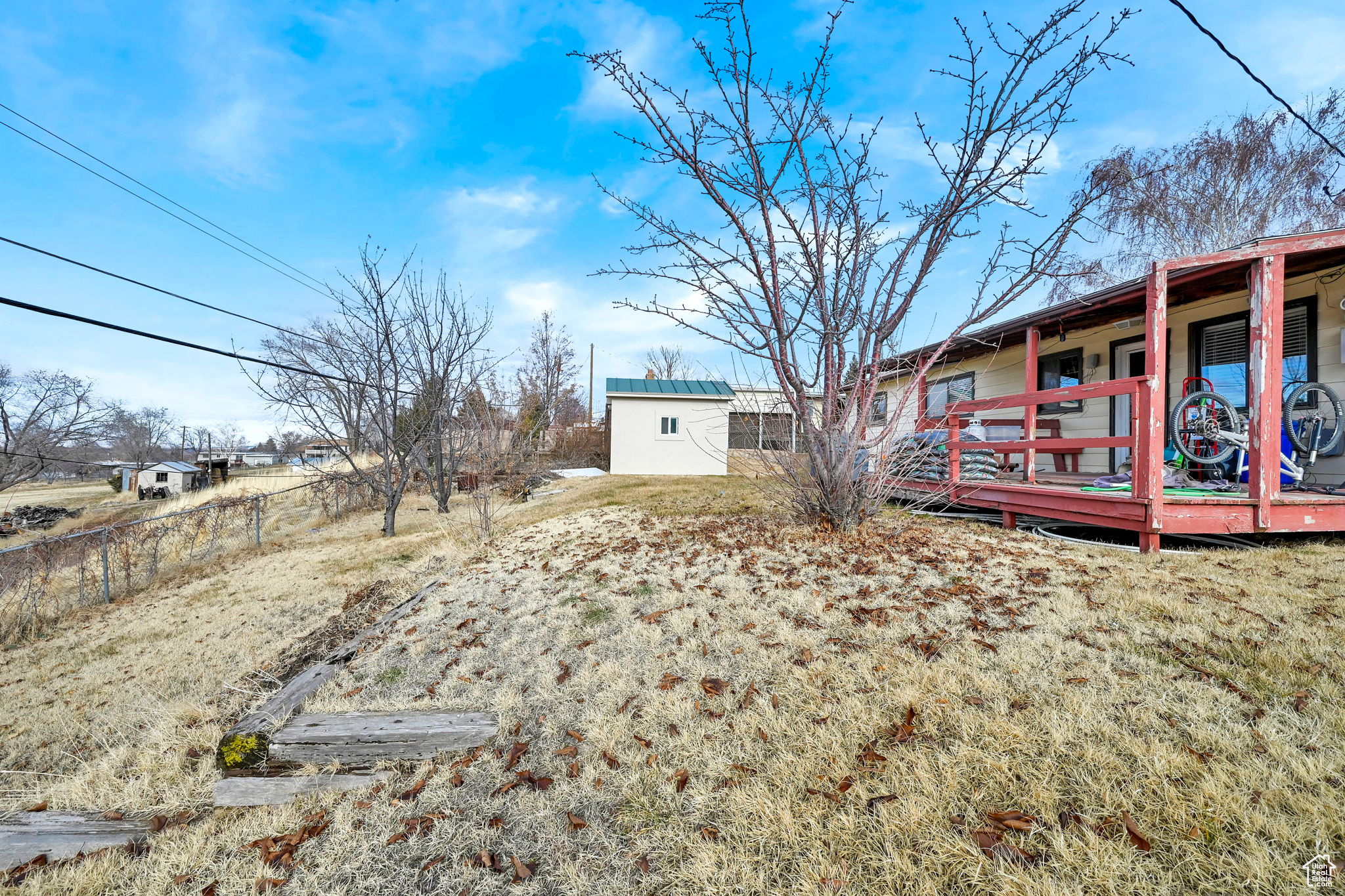 View of yard with a deck