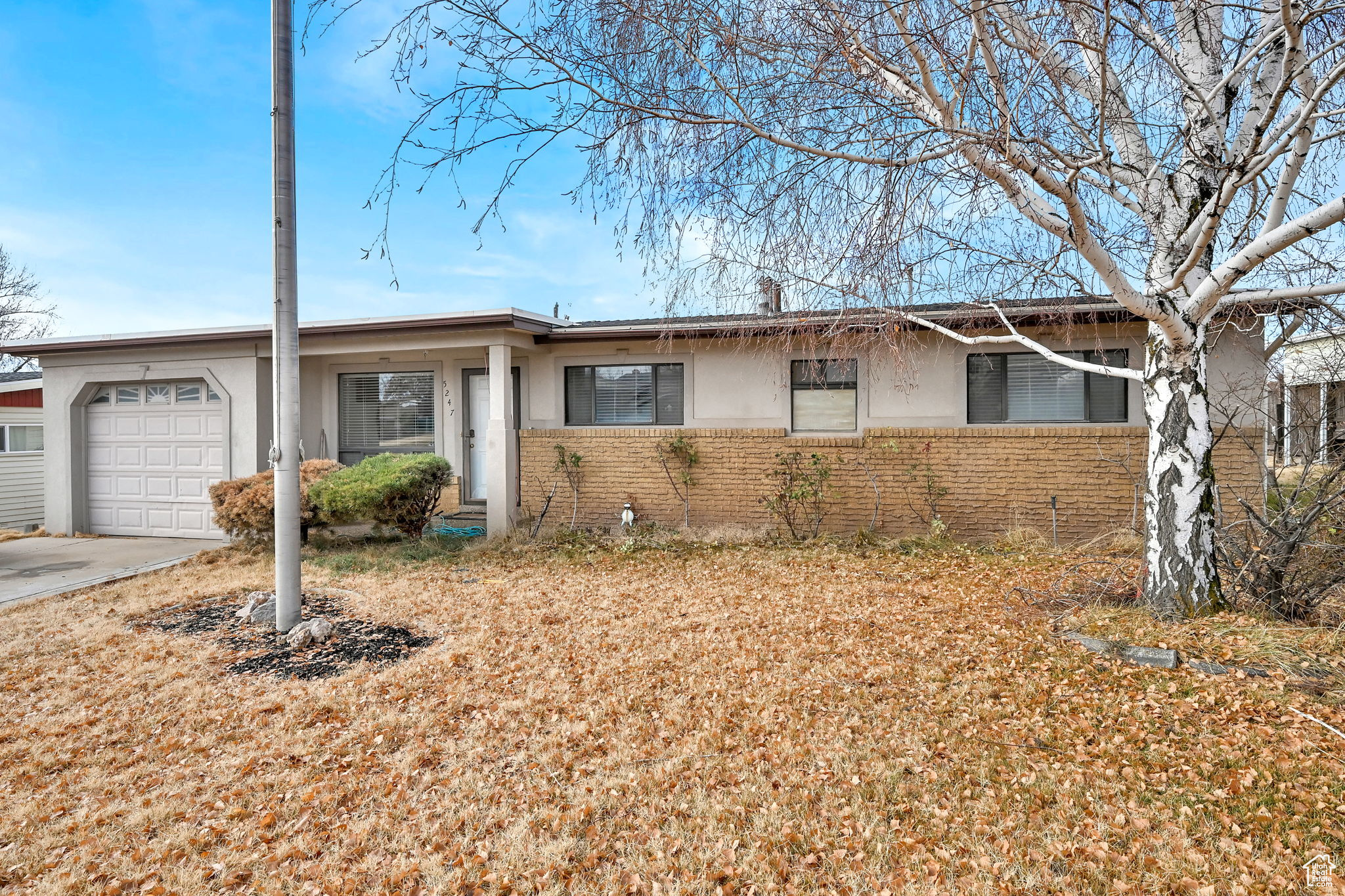 Single story home with a garage