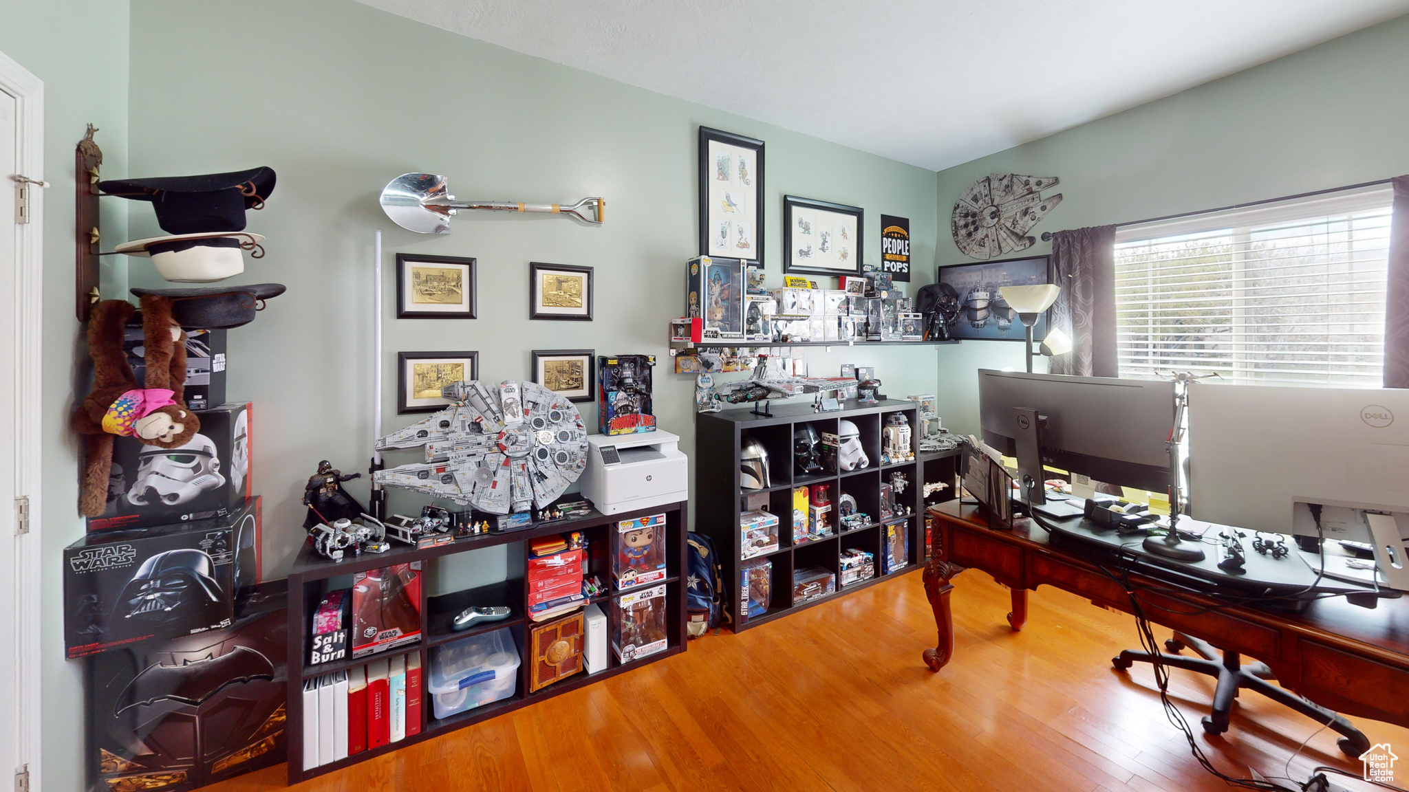 Office space with hardwood / wood-style flooring