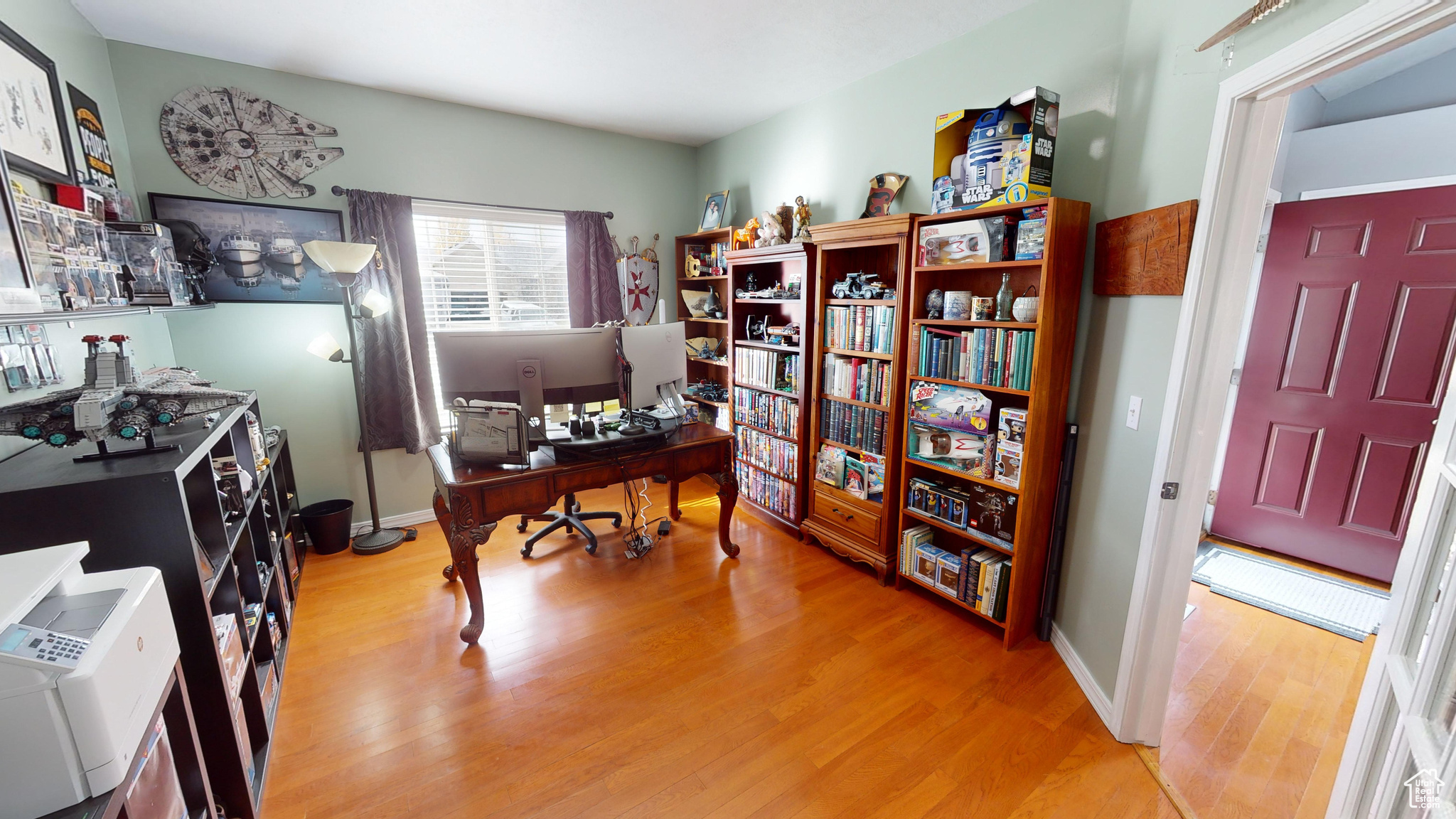 Office area with hardwood / wood-style floors