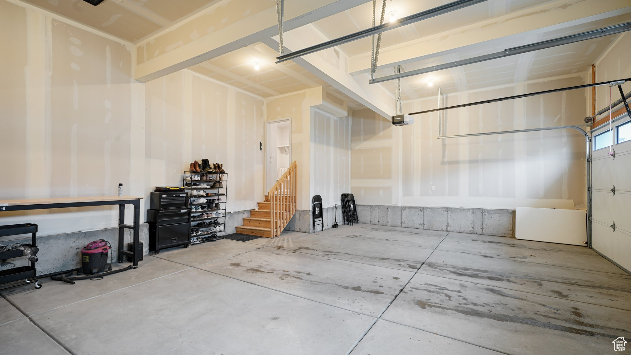 Three car garage with a garage door opener