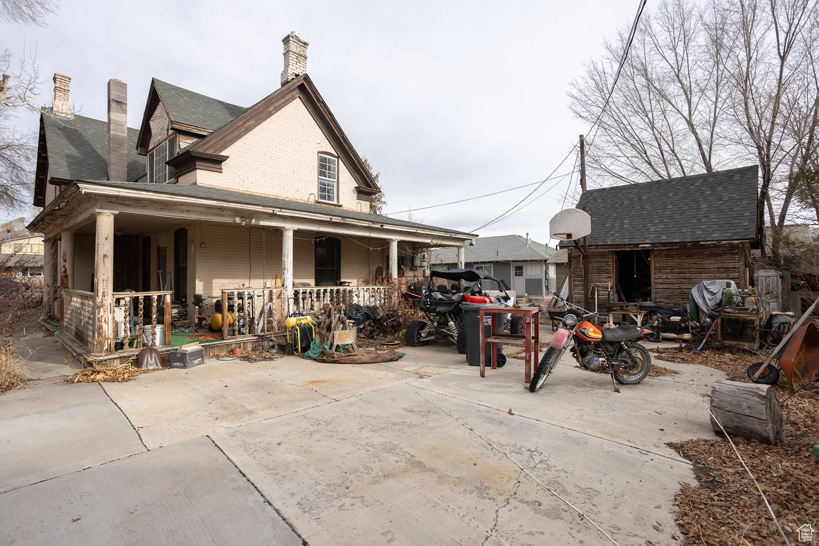 View of side of property featuring a porch