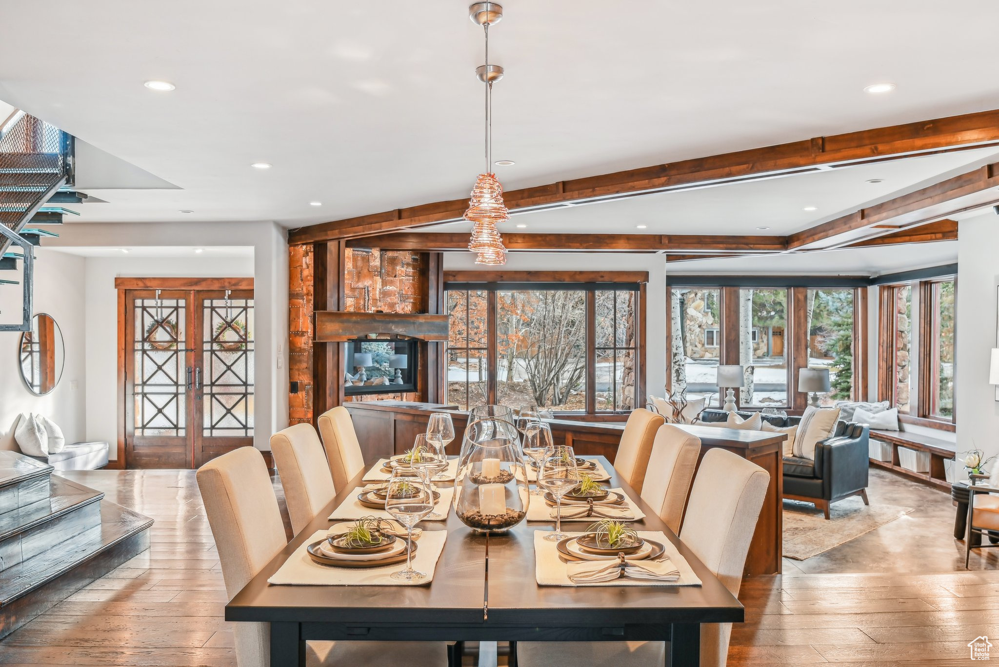 Dining space with french doors and light hardwood / wood-style floors