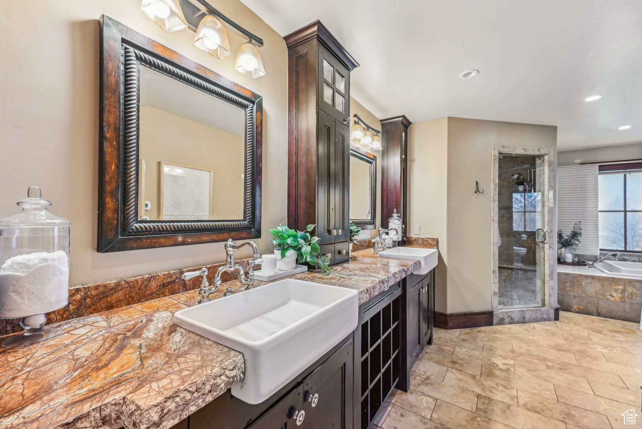 Bathroom with vanity and independent shower and bath