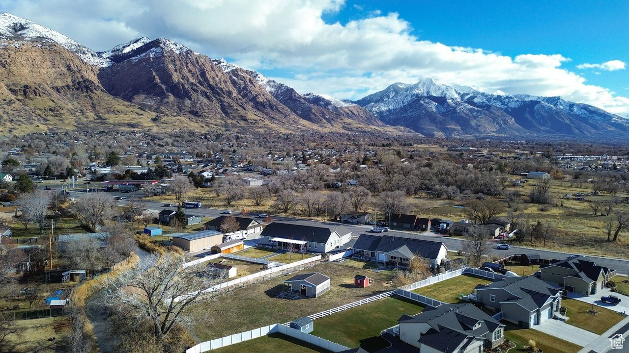 Birds eye view of the property and mountain view