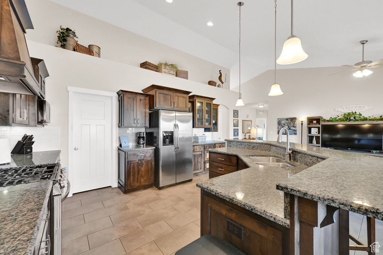 Kitchen is spacious and includes a pantry.