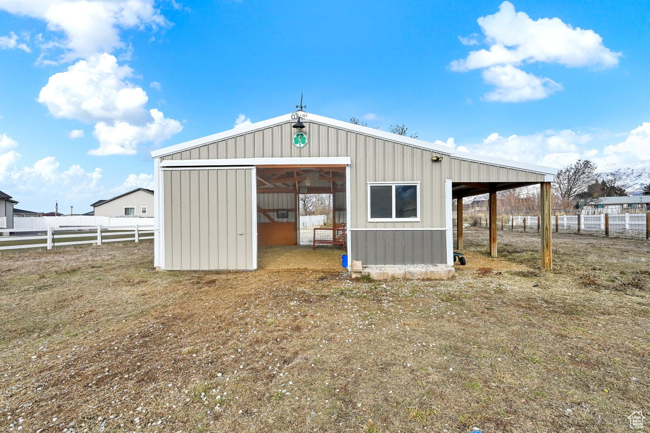 Barn 24' x 24' with 8' door at front and 6' door at back. Has Power and Water.