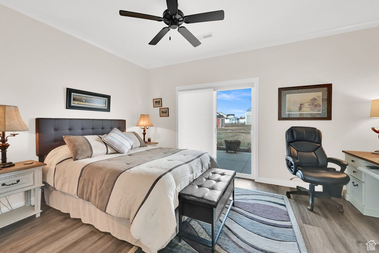 In-law Suite bedroom is large with sliding door to the backyard.