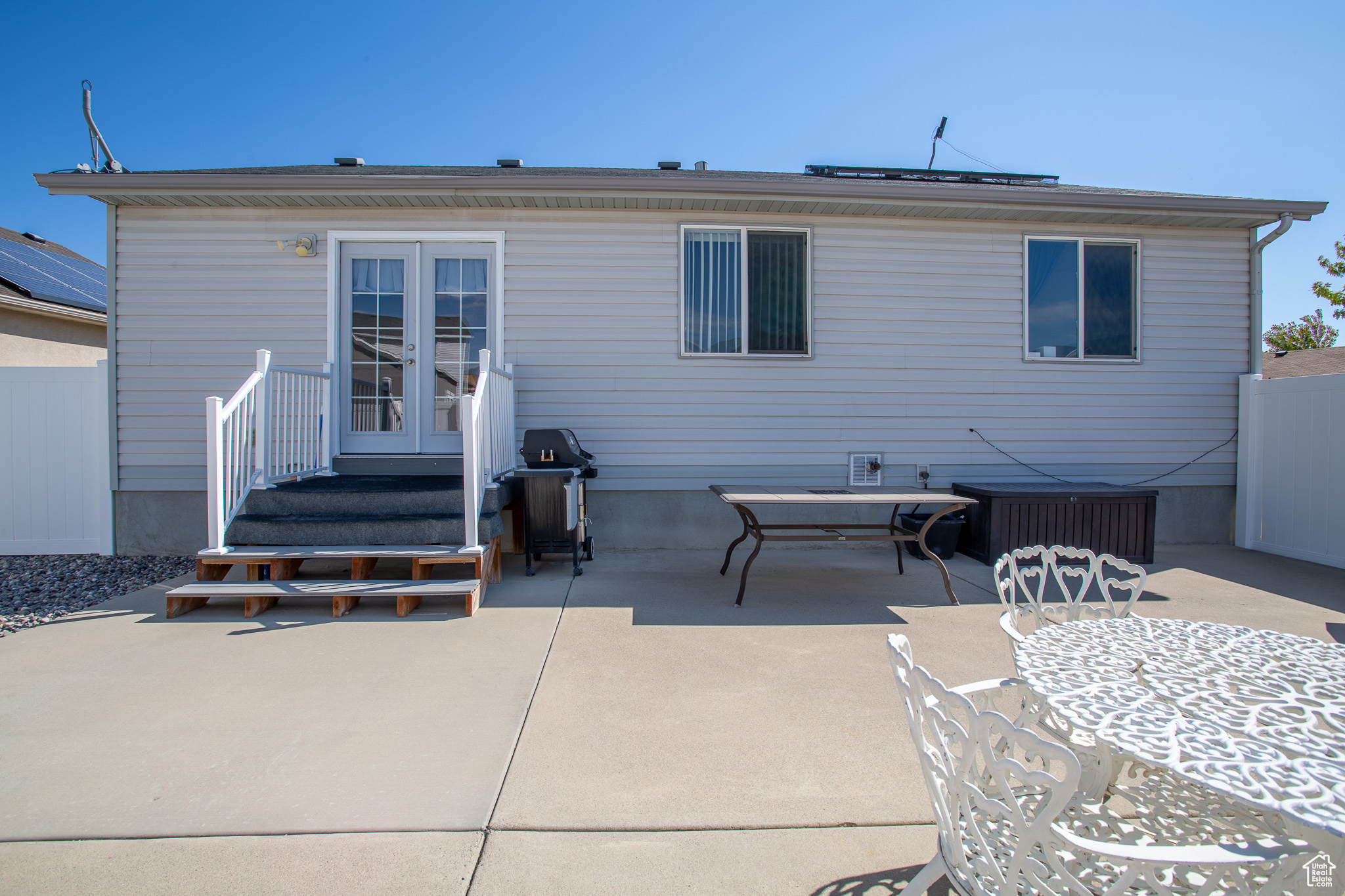 Back of house featuring french doors and a patio